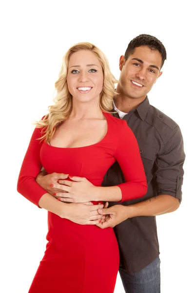 Man's arms around woman's waist. — Stock Photo, Image