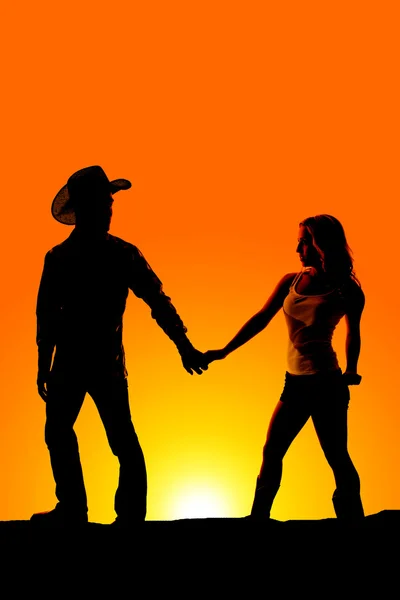 A silhouette of a man and woman — Stock Photo, Image