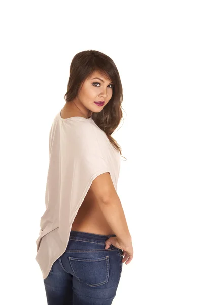 Žena v džínách s hnědý top — Stock fotografie