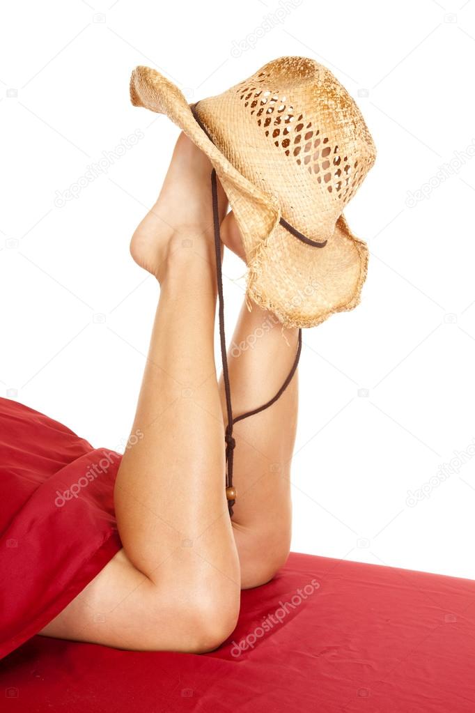 Woman legs with hat