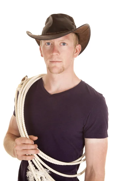 Homem de camisa roxa chapéu corda olhando — Fotografia de Stock