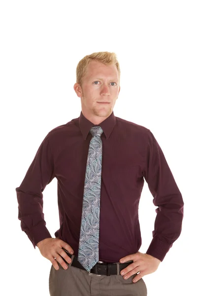 Man in tie purple shirt hands on hips looking — Stock Photo, Image