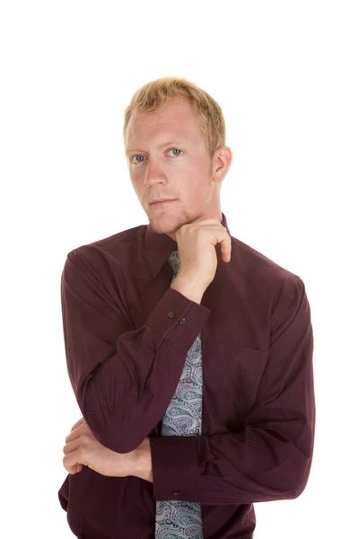 Man in tie purple shirt portrait hand under chin serious — Stock Photo, Image