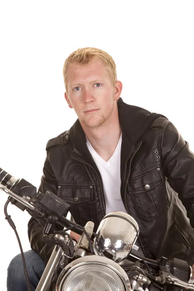 Man on motorcycle black jacket looking close — Stock Photo, Image