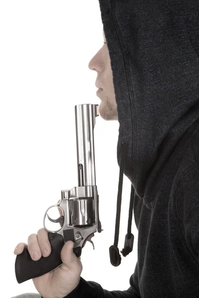 Profile of man close with gun and hoodie — Stock Photo, Image