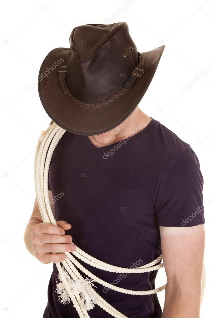 man in purple shirt hat rope look down
