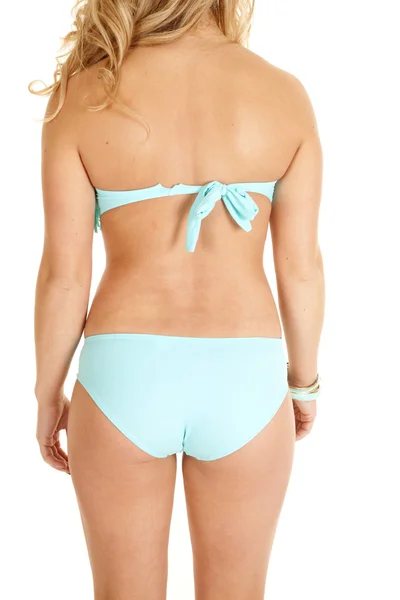 Vrouw blauwe bikini van terug — Stockfoto