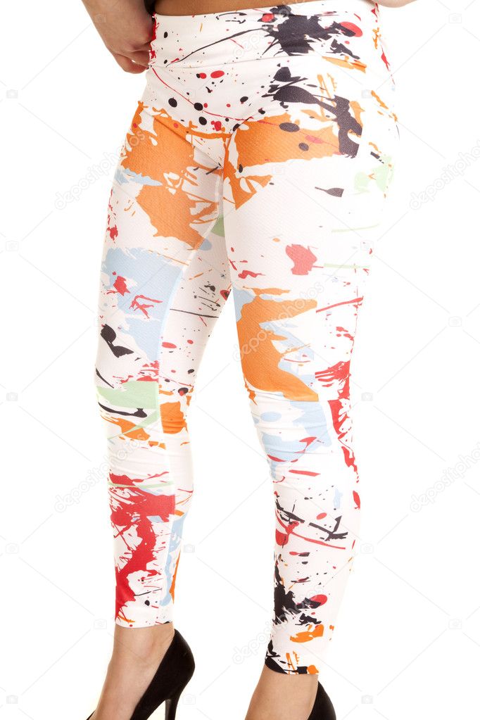 Woman in paint splat leggings .