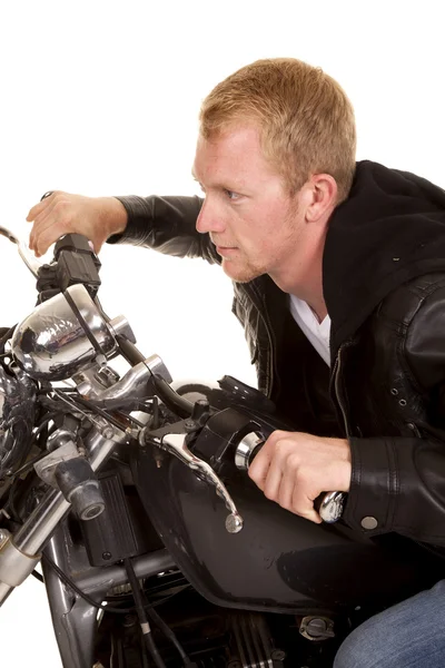 Man in black jacket motorcycle side lean — Stock Photo, Image