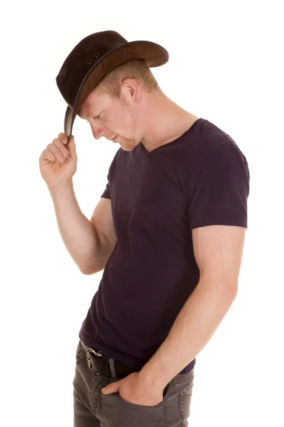 Man in purple shirt cowboy hat side look down — Stock Photo, Image