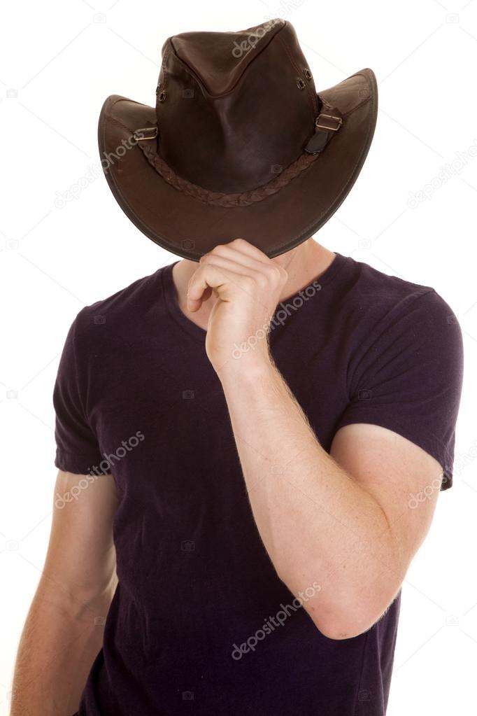 man in purple shirt cowboy hat face hid