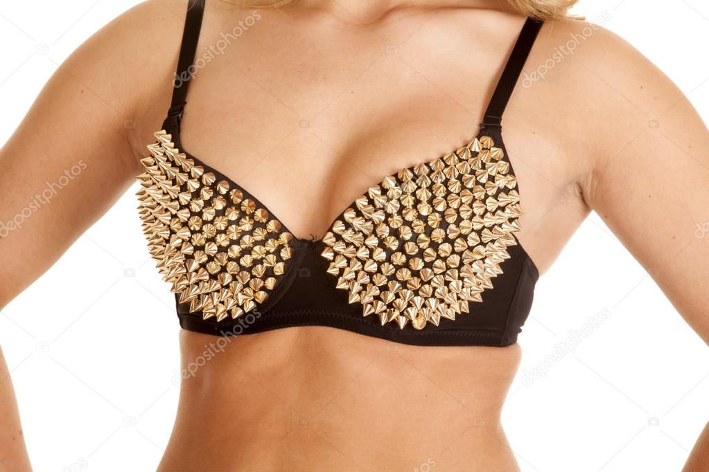 Close up woman gold spike bra Stock Photo by ©alanpoulson 55409623