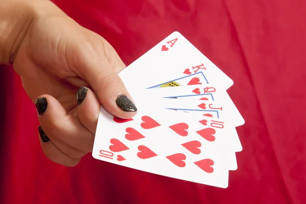Ruka držící hrací karty — Stock fotografie