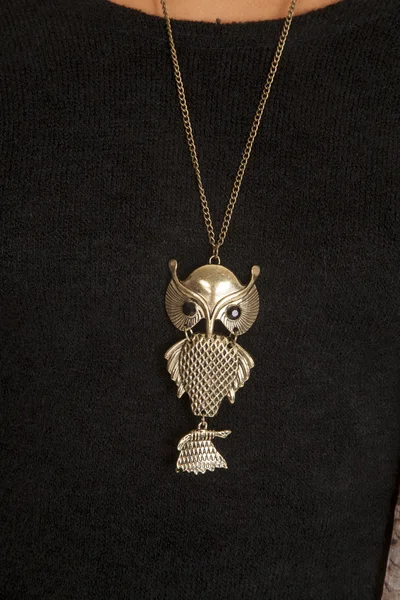 Woman wearing owl necklace — Stock Photo, Image