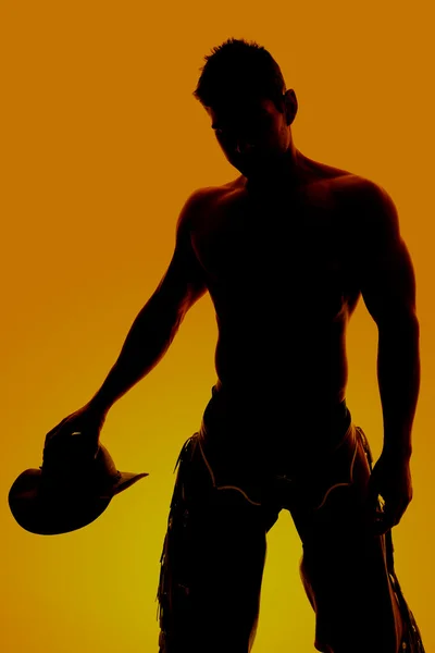 Silhouette of  cowboy with no shirt — Stock Photo, Image