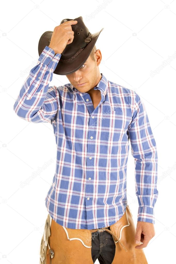 Cowboy wearing blue plaid shirt