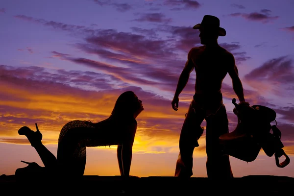Silhouette of woman and cowboy — Stock Photo, Image