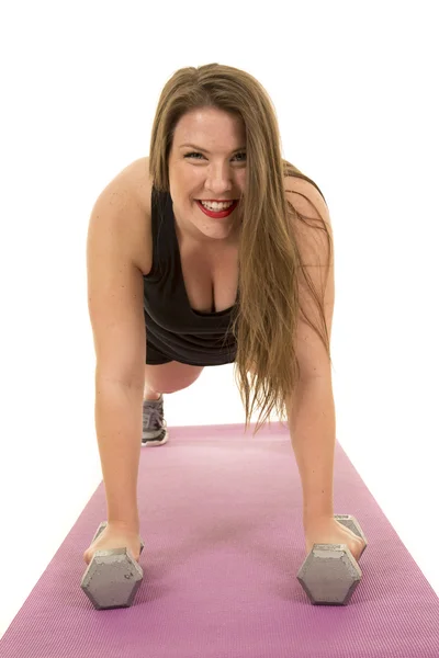 Mujer joven haciendo ejercicio — Foto de Stock