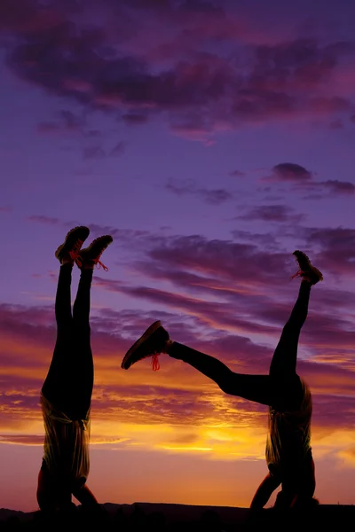 Silhouette of woman and manon hands — Stock Photo, Image