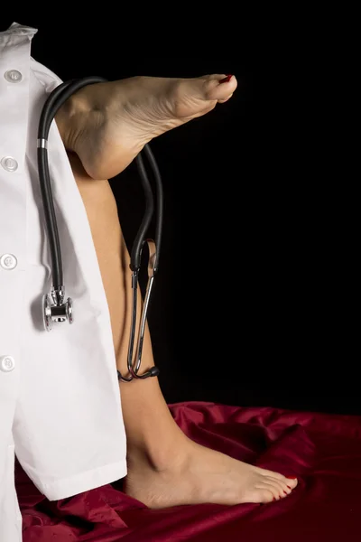 Woman in doctor jacket with stethoscope — Stock Photo, Image