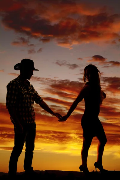 Silhouette of a woman and cowboy — Stock Photo, Image