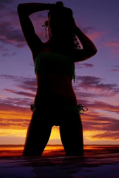 Silhouet van een vrouw in een bikini — Stockfoto