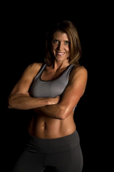 Fitness woman on black — Stock Photo, Image