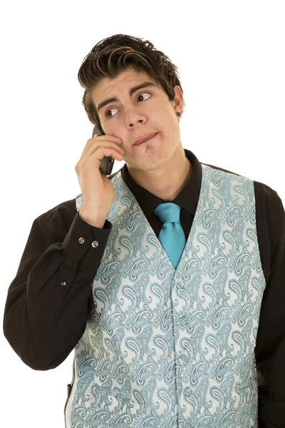 Man in black suit blue vest on phone — Stock Photo, Image