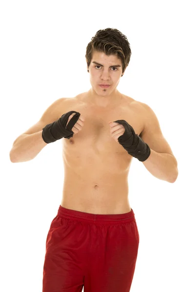 Man no shirt red shorts hand wrapped for fighting up — Stock Photo, Image