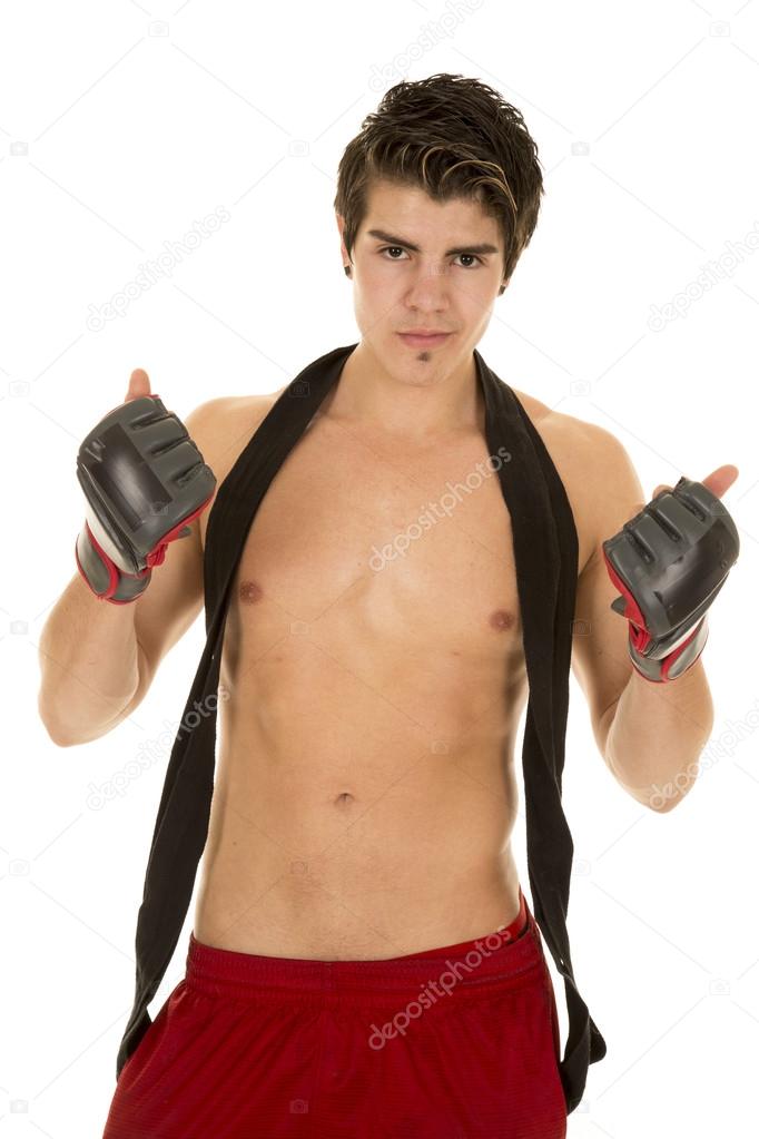 man no shirt red shorts gloves up