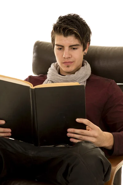 Man with scarf reading — Stock Photo, Image