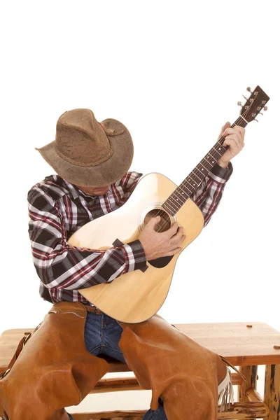 Cowboy play guitar looking down — Stock Photo, Image