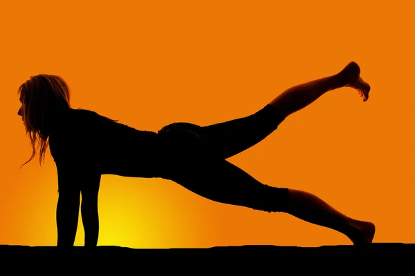 Silhouette woman doing yoga — Stock Photo, Image