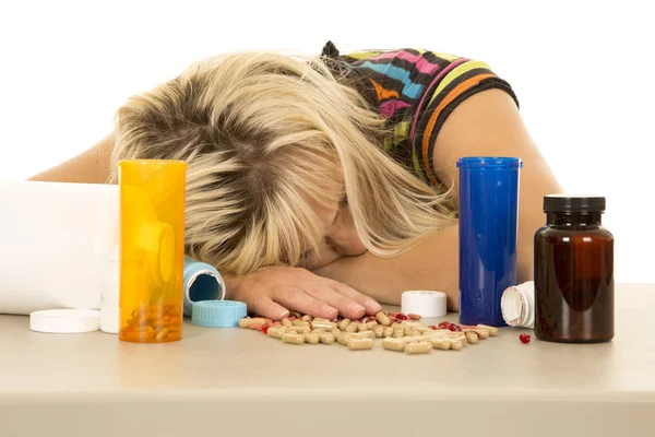 Woman with lots of pills — Stock Photo, Image