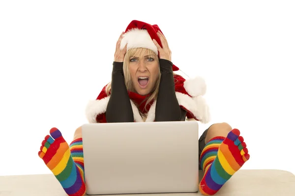 Woman in Santa hat with laptop — Stock Photo, Image