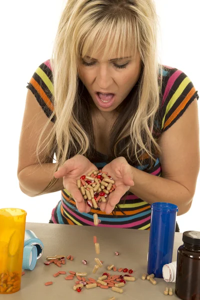 Woman with lots of pills — Stock Photo, Image