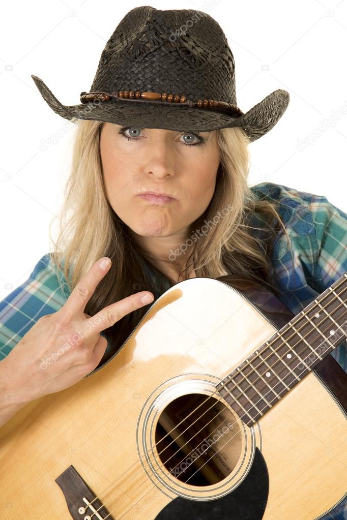 Cowgirl playing the guitar