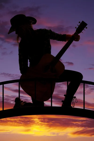 Silhouette cowgirl  with guitar — Stock Photo, Image