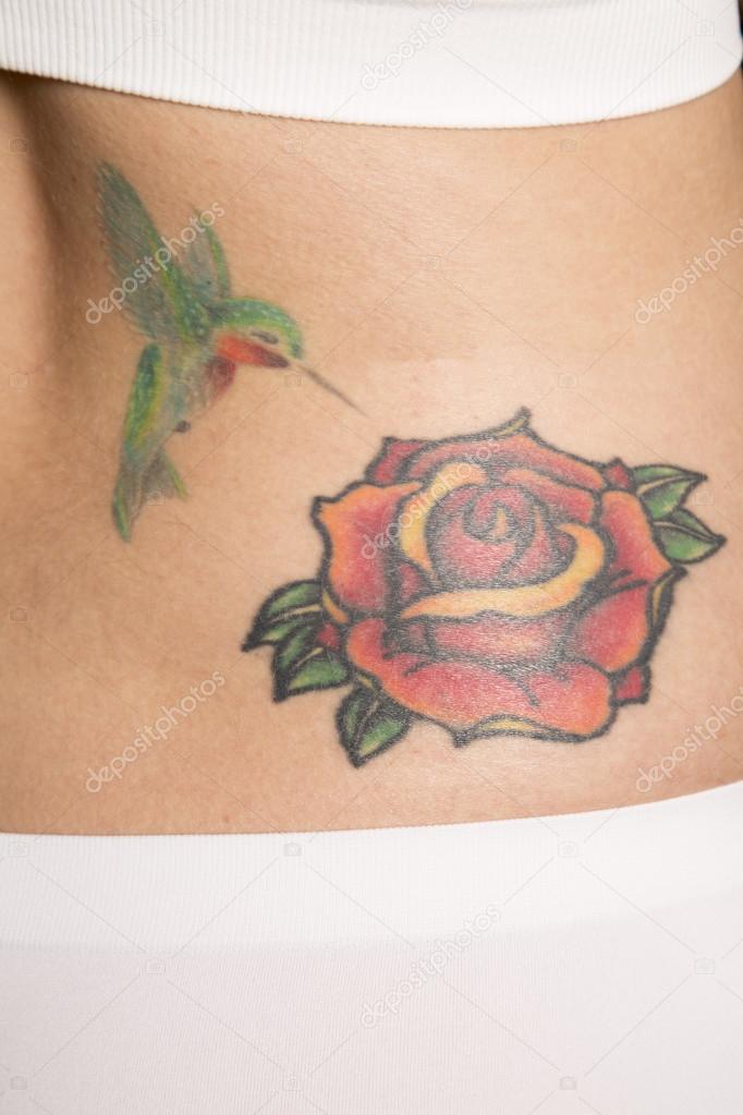 Rose and hummingbird tattoo