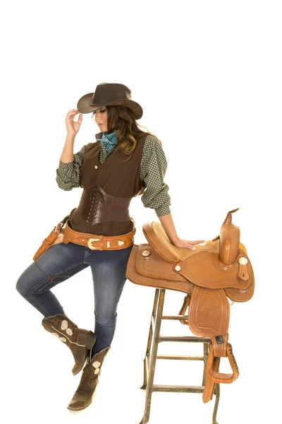 Giovane cowgirl con sella — Foto Stock