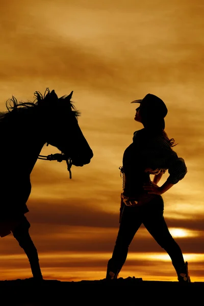 Silhouette of cowgirl outdoors — Stock Photo, Image