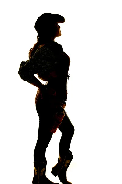 Silhouette of cowgirl  standing — Stock Photo, Image