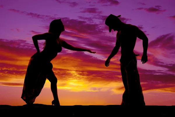 Silhouette of woman and cowboy — Stock Photo, Image