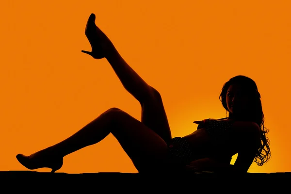 Silhouette einer Frau im Bikini — Stockfoto