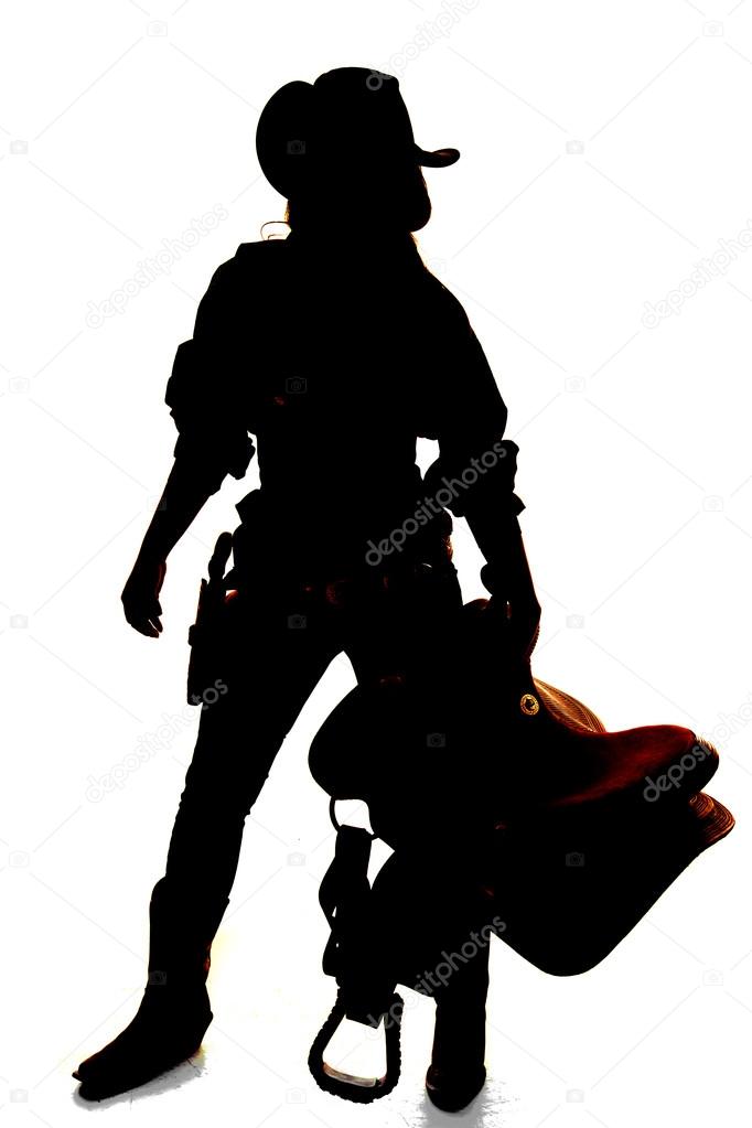 Silhouette of cowgirl  standing