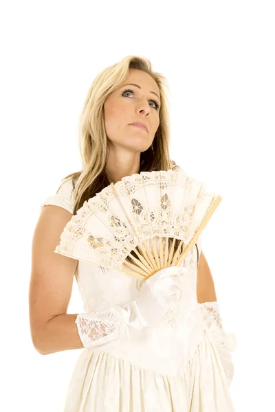 Donna nel suo vestito fantasia con un ventilatore — Foto Stock