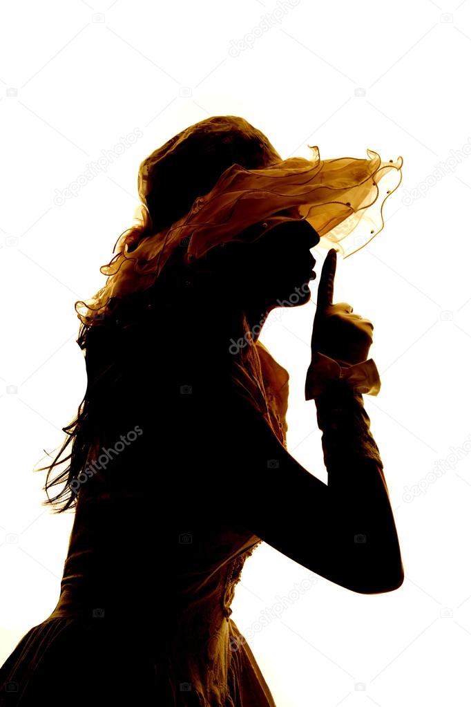 Silhouette of a woman posing