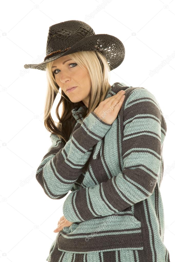 Cowgirl in blue and black poncho