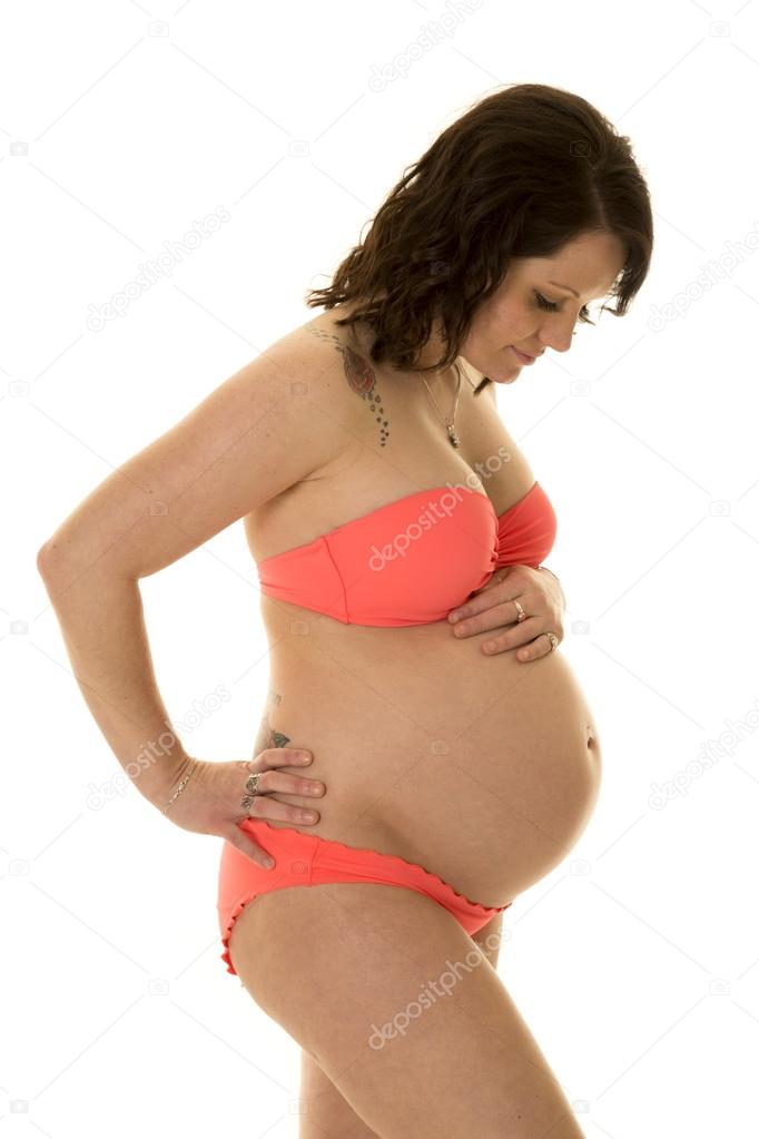Pregnant woman wearing bikini