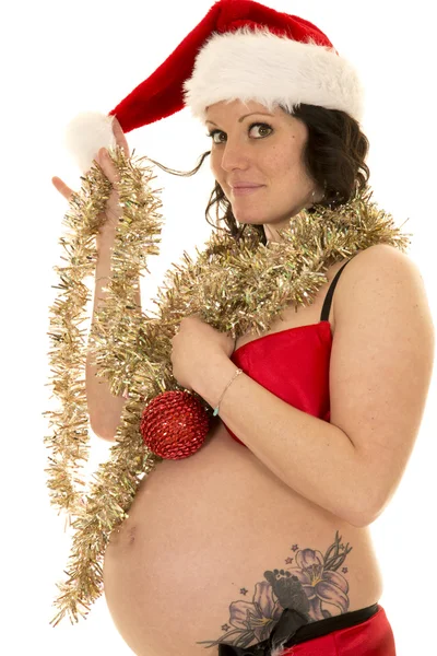 Femme enceinte en tenue de Père Noël — Photo